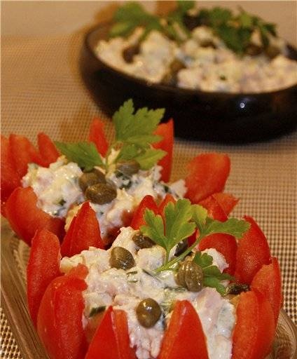 Tomatoes stuffed with tuna salad and capers