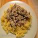 Pasta with mushroom ragout and chopped lamb in a creamy sauce