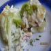 Squid cabbage rolls in creamy garlic sauce