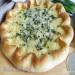 Pizza bread with cheese and green onions