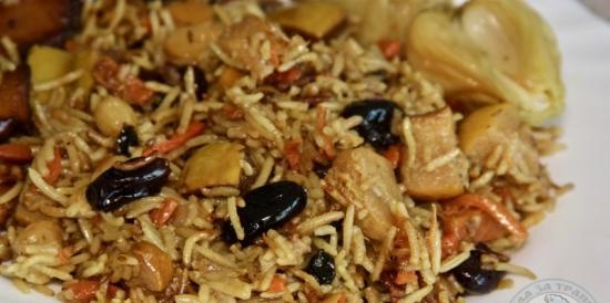 Pilaf with dried fruits and quince (without meat)