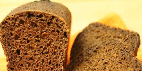 Rye-wheat shaped bread on a big bag (with liquid yeast) with caraway seeds and carrot fiber