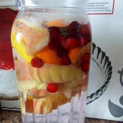 Hot cranberry-based fruit and berry drink