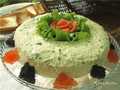 Layered Russian salad with trout and caviar