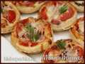 Mini pizzas with smoked sausages