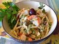 Reverse pasta with green peas and seafood